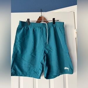 Stussy Aqua Blue Shorts with Black Logo